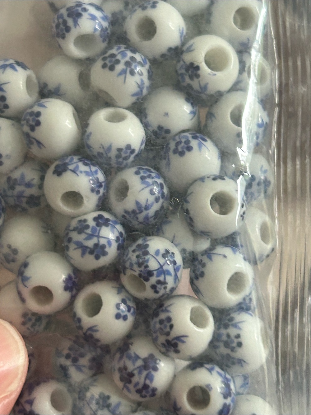 4/$100 White Porcelain Beads with Blue Floral Pattern